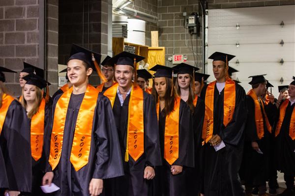 Line of GRHS Graduates entering arena